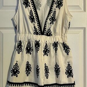 Chic Sleeveless Romper with Black Embroidery